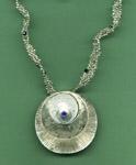 Engraved silver pendant