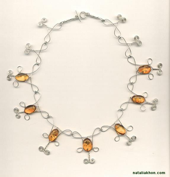 Silver wire necklace with amber