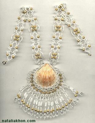 Beaded necklace with a shell